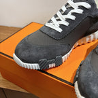 Unisex sneakers toe detail, dark suede upper, white laces and textured white outsole