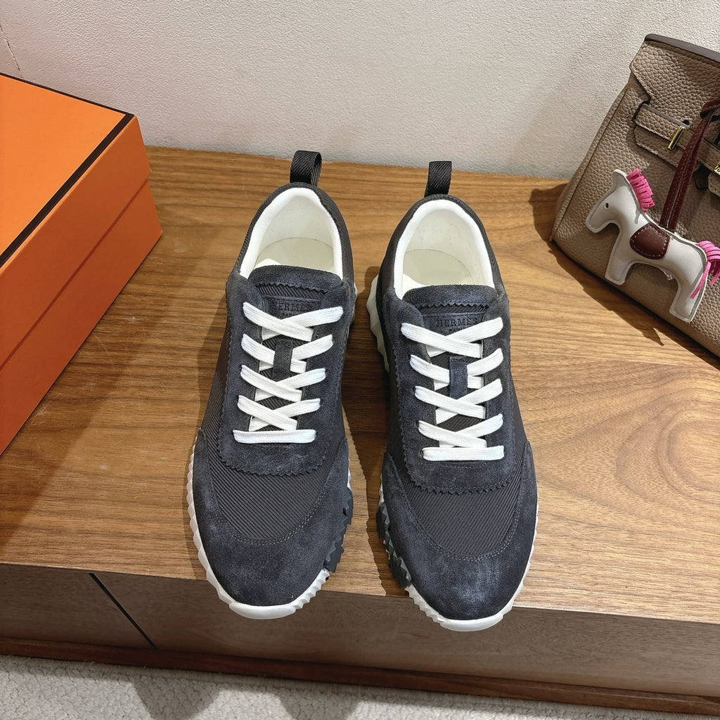 Unisex sneakers, dark upper with white laces and white rubber sole