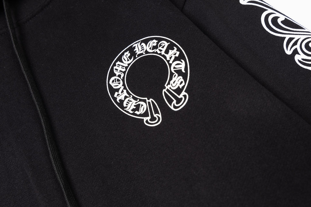 Black hoodie front close-up with circular chest logo graphic