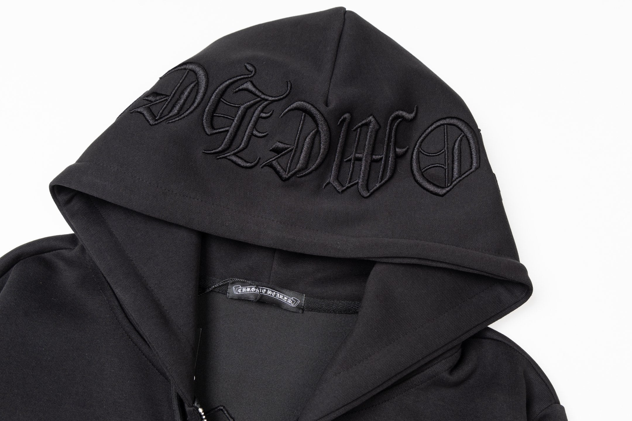Black hood with raised embroidered script logo across the front