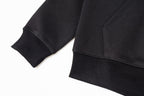 Black zip-up jacket sleeves with ribbed cuffs