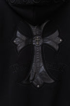 Black zip hoodie with large embroidered cross logo at the chest