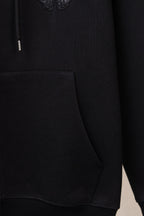 Black zip hoodie with kangaroo pocket and ribbed hem
