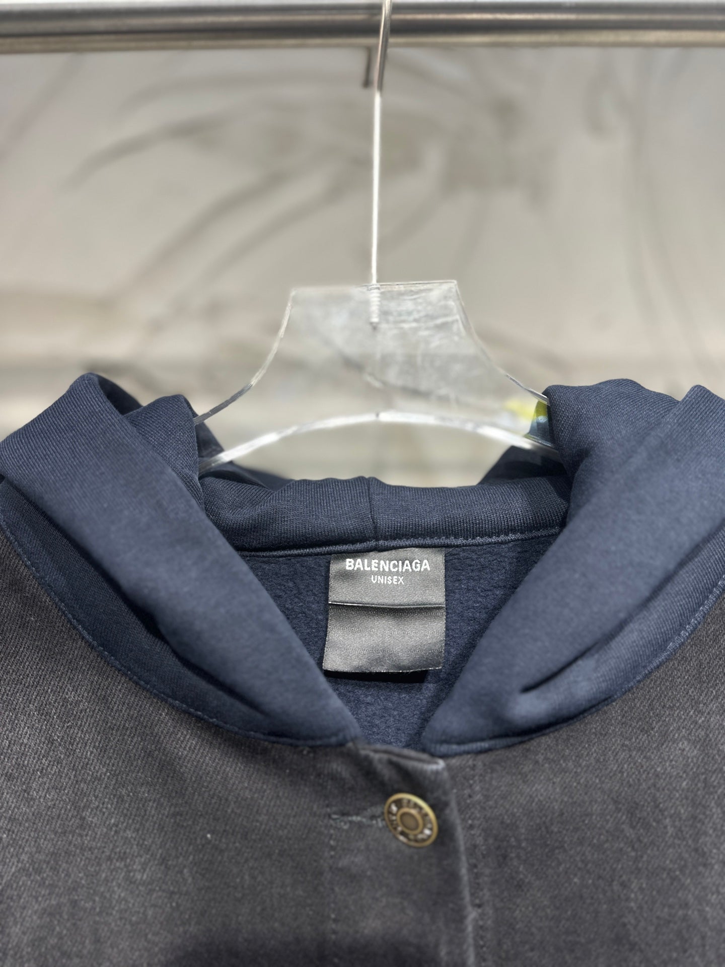 Dark denim hooded jacket neckline with Balenciaga interior label