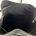 YSL black leather bag interior with front pocket and visible lining