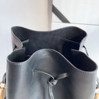 YSL black leather bag interior with open top, side pockets, and lining