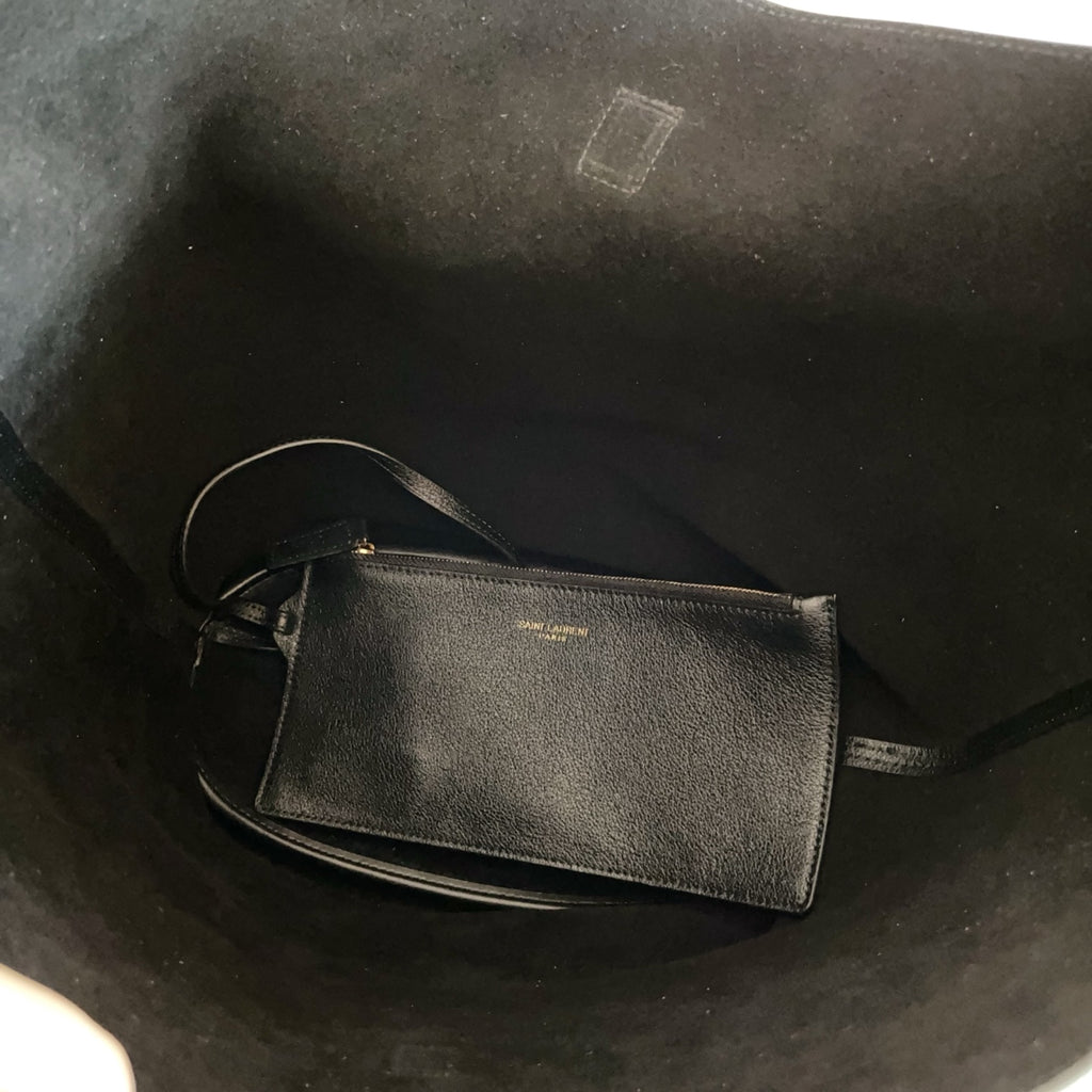YSL black leather crossbody pouch with thin strap and small gold logo