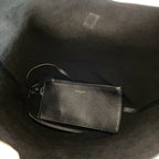 YSL black leather crossbody pouch with thin strap and small gold logo