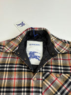 Burberry plaid jacket collar with black lining and embroidered logo on inner tag