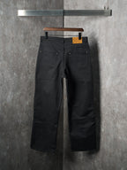 Louis Vuitton pants, dark black, front view with two pockets and button closure at waist