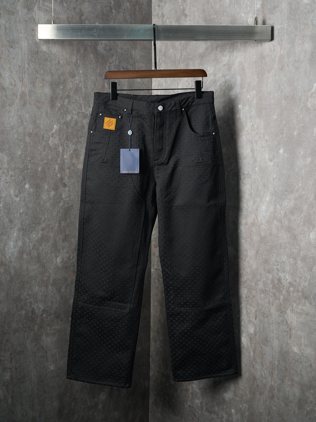 Louis Vuitton pants in dark black with belt loops, button waist, and wide straight legs