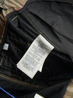 Burberry pants interior with care label and gold-tone trim