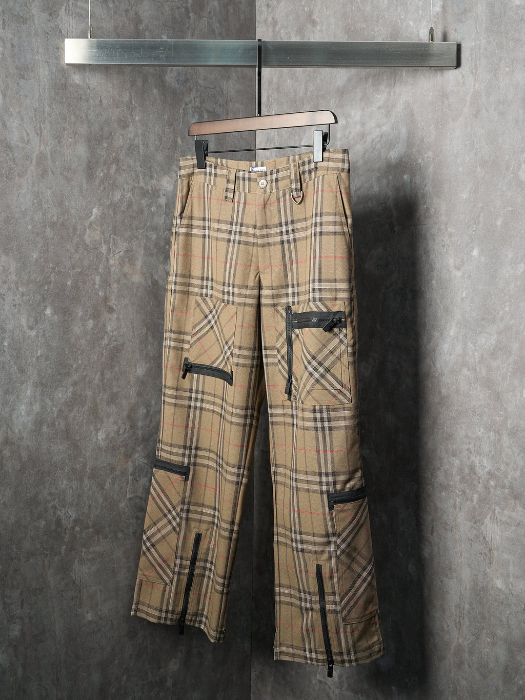 Burberry plaid cargo pants with black-trim flap pockets and button waistband