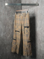 Burberry plaid cargo pants with black-trim flap pockets and button waistband