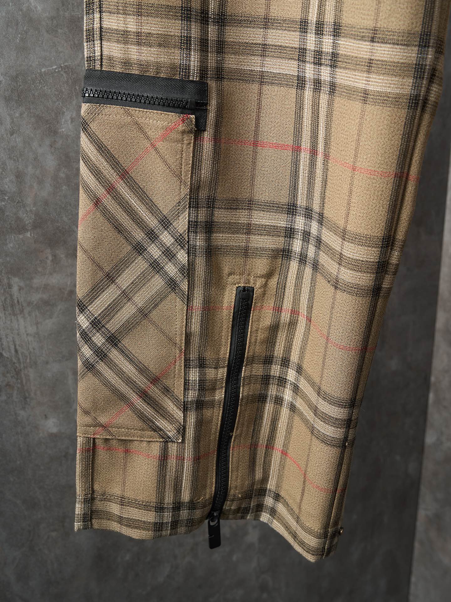 Burberry plaid cargo pants with side flap pocket and vertical zipper