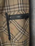 Burberry plaid pants with zippered thigh pocket and black trim