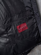 Gucci long jacket with red GUCCI logo patch and front zipper