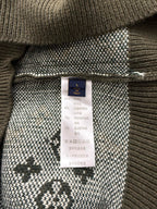 Brown knit sweater inside label with Louis Vuitton tag and fabric composition