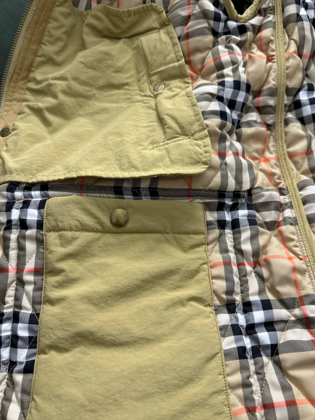 Light yellow jacket with stand collar and plaid quilted lining