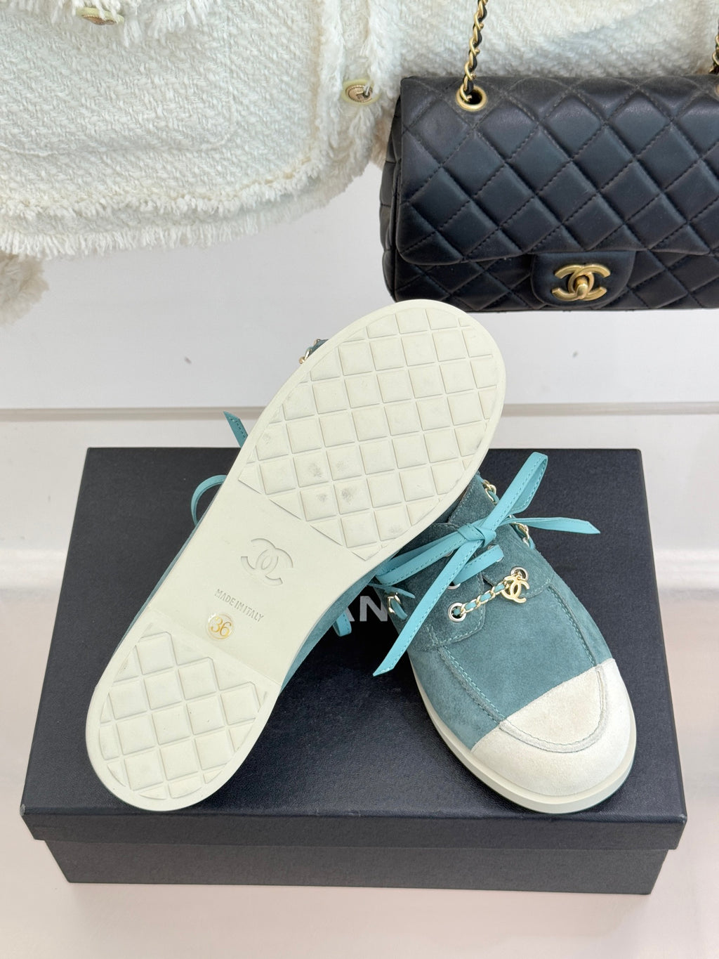 Chanel ladies blue suede sneakers with white rubber sole, teal laces and gold chain trim