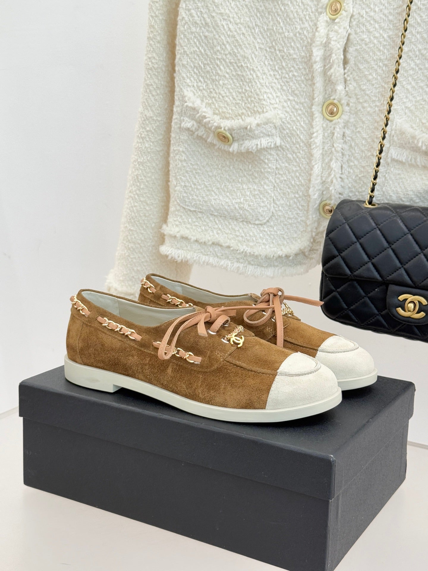 Ladies lace-up suede sneakers in tan with white rubber sole and pink laces