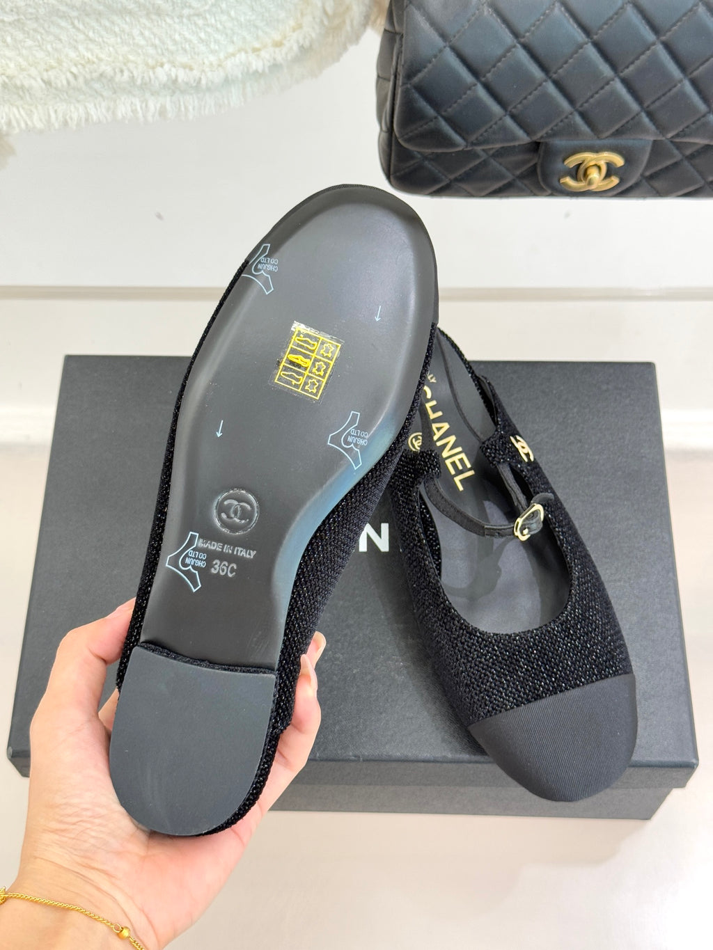 Chanel ladies black slingback flat sole with grip texture and size markings
