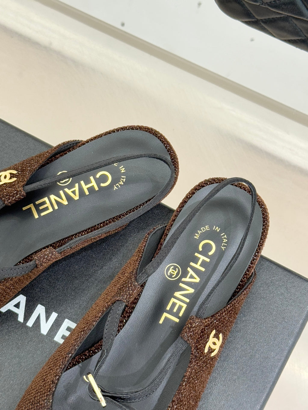 Chanel flats, brown textured uppers with navy lining and gold CC accent