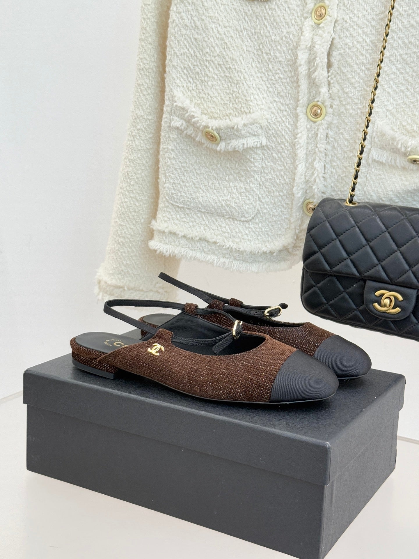 Chanel ladies flats, brown textured fabric with dark navy sole and gold CC detail