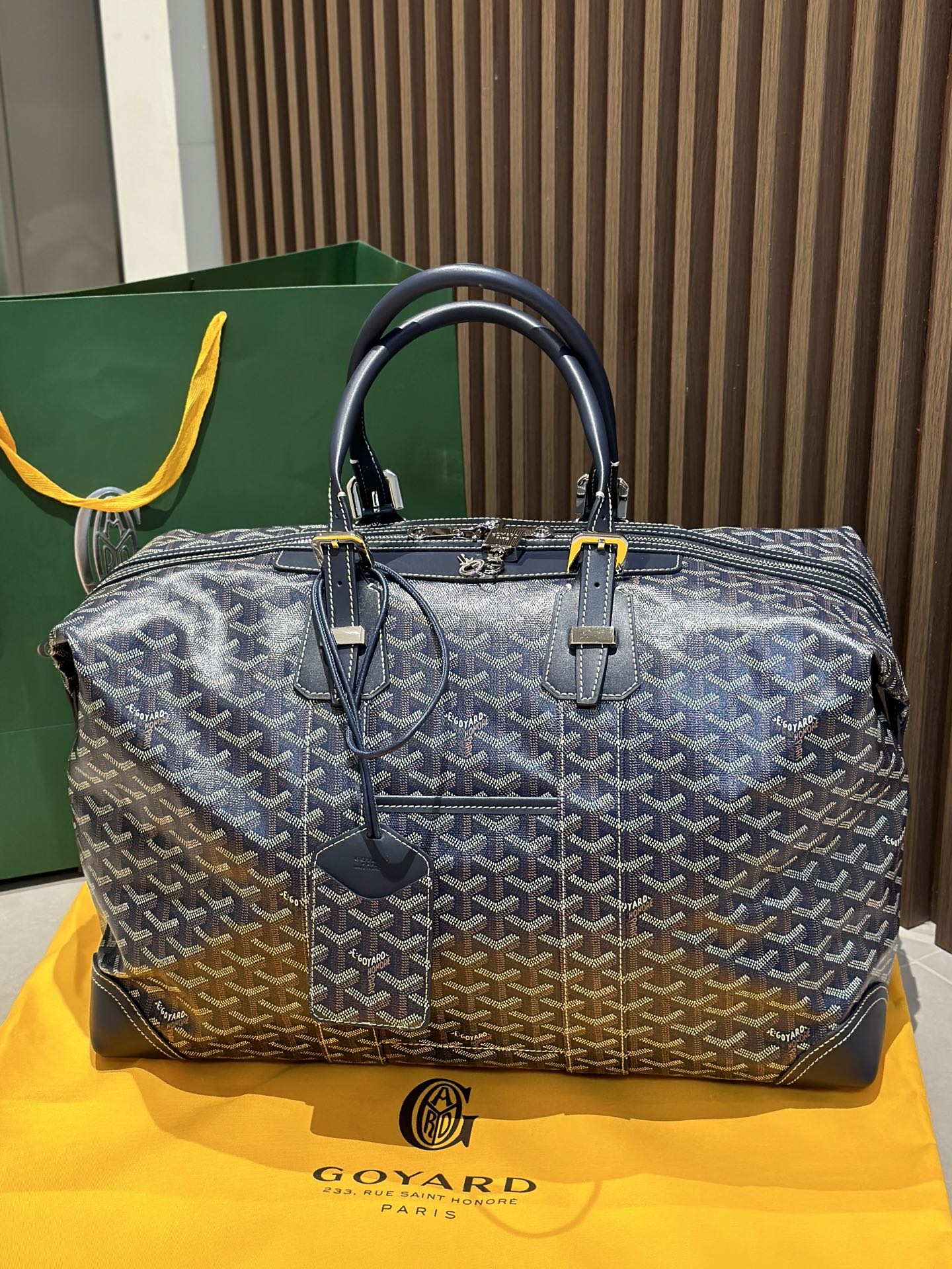 Goyard duffel bag, dark blue monogram canvas, two top handles, zip closure.