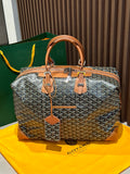 Goyard bag with gray patterned Goyardine and tan leather handles, top zipper