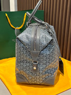Goyard monogram backpack-duffel style bag in light gray with front pocket tab