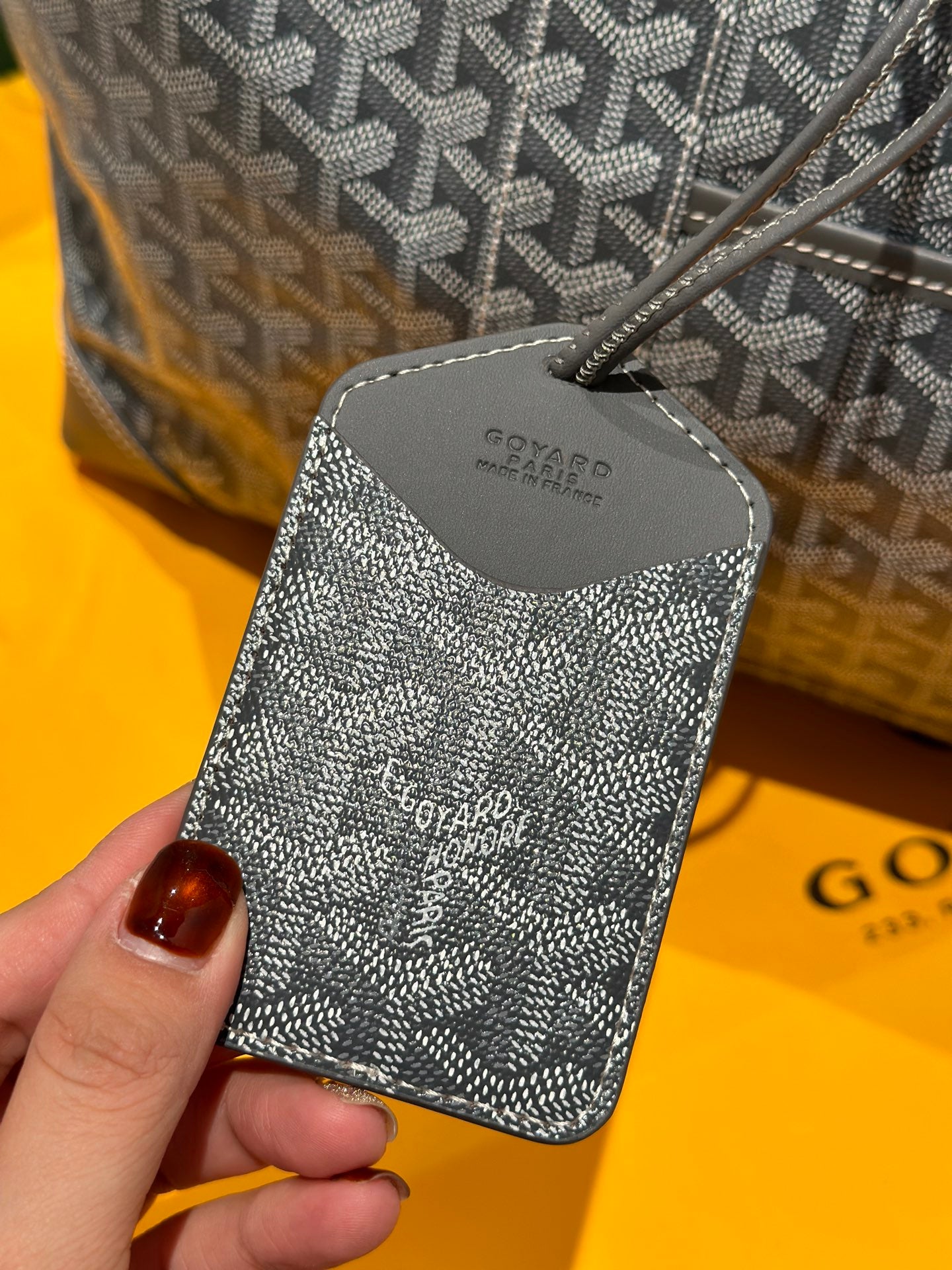 Goyard patterned key pouch with logo, gray fabric and metal zipper pulls