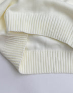 Knit sweater ribbed cuffs and hem bands in pale yellow