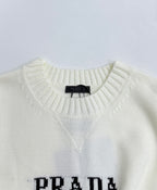 Crew-neck knit sweater neckline with PRADA label tag