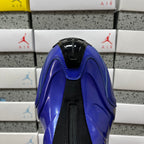 Balenciaga unisex sneakers showing black pull tab and glossy blue toe and upper