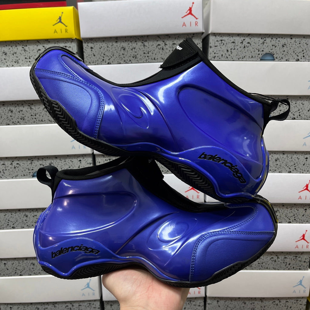 Balenciaga unisex sneaker pair, glossy blue uppers with black sock collars and tread soles