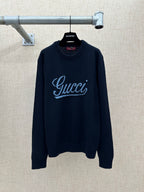 Navy knit sweater with 'Gucci' script logo and ribbed crew neckline