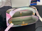 Louis Vuitton handbag open interior view with pastel croc exterior and top handle