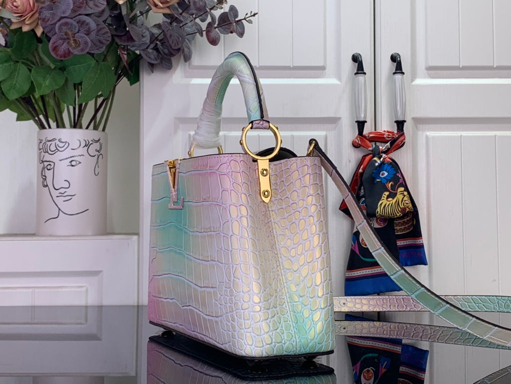 Louis Vuitton handbag with croc-embossed pastel finish, top handles and shoulder strap