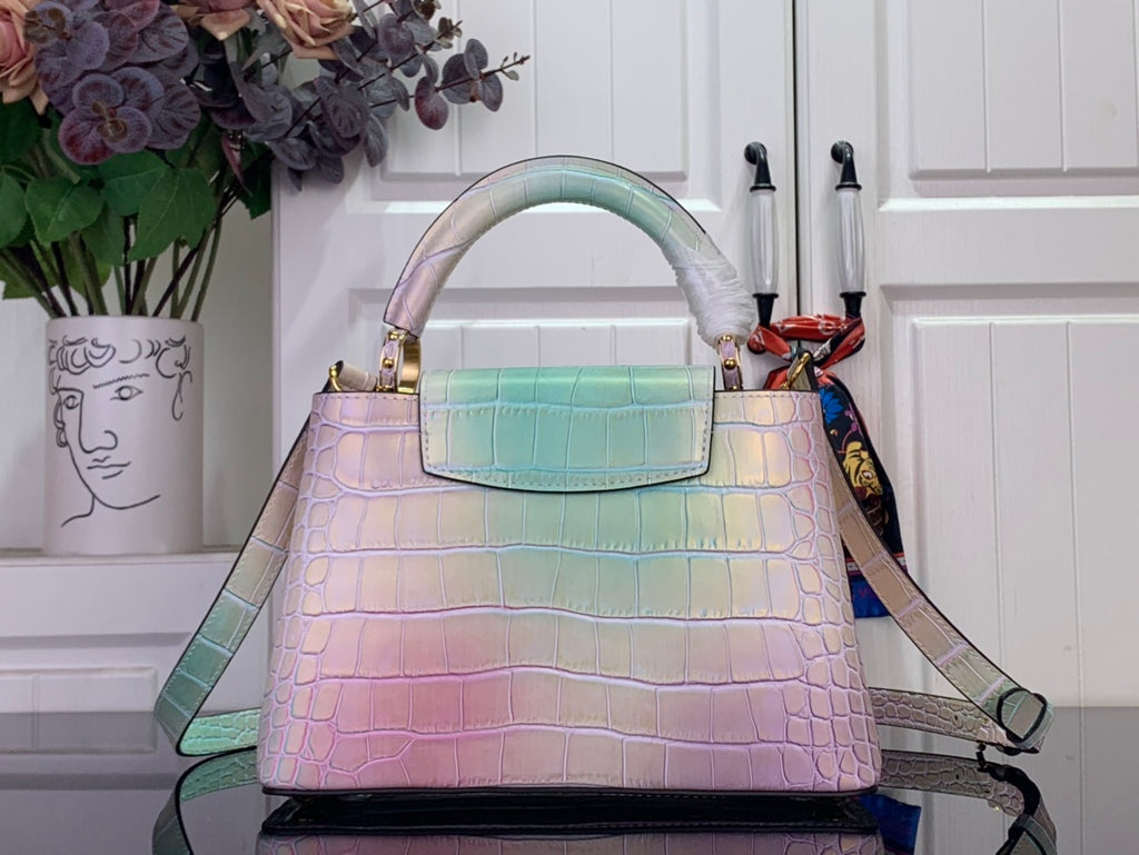 Louis Vuitton handbag with pastel pink and blue croc texture, wide top handle and strap