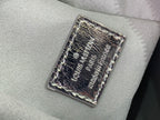 Louis Vuitton engraved hardware plate on textured silver monogram leather