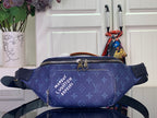 Blue monogram belt bag with top zip and adjustable strap, metal buckle detail