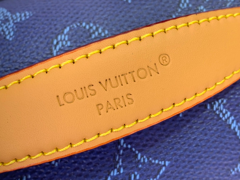 Louis Vuitton Paris logo patch with yellow stitching on blue monogram belt bag