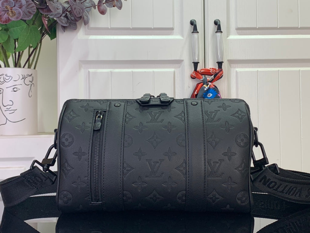 Men's Louis Vuitton monogram duffel bag with top handles and shoulder strap