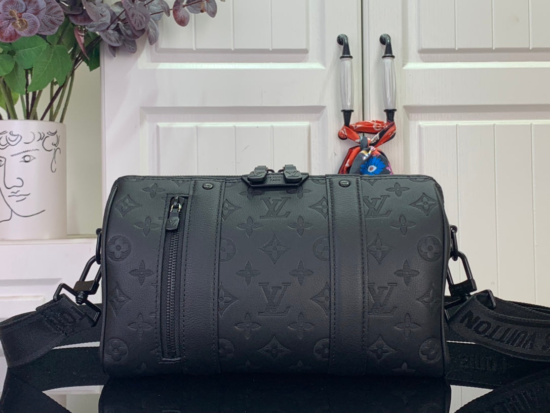 Dark monogram canvas duffel bag with zip top and two side handles