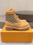 Tan lace-up ankle boots with monogram canvas panels and LV logo, chunky sole