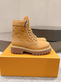 Tan suede ankle boot with lace-up front and LV monogram on side