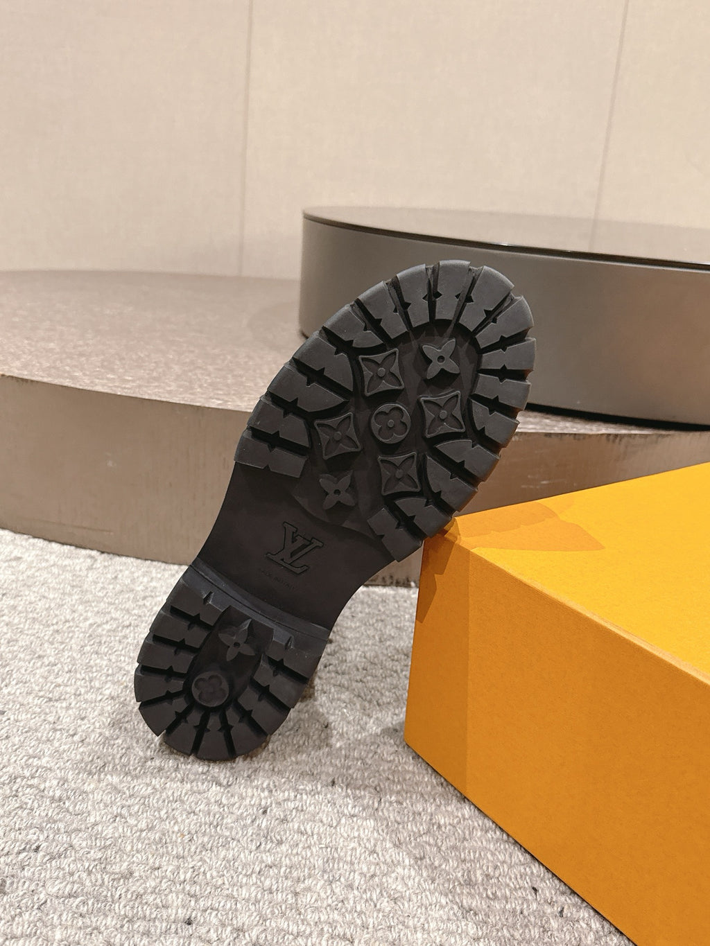 Louis Vuitton unisex black boot outsole with deep rubber tread, logo detail
