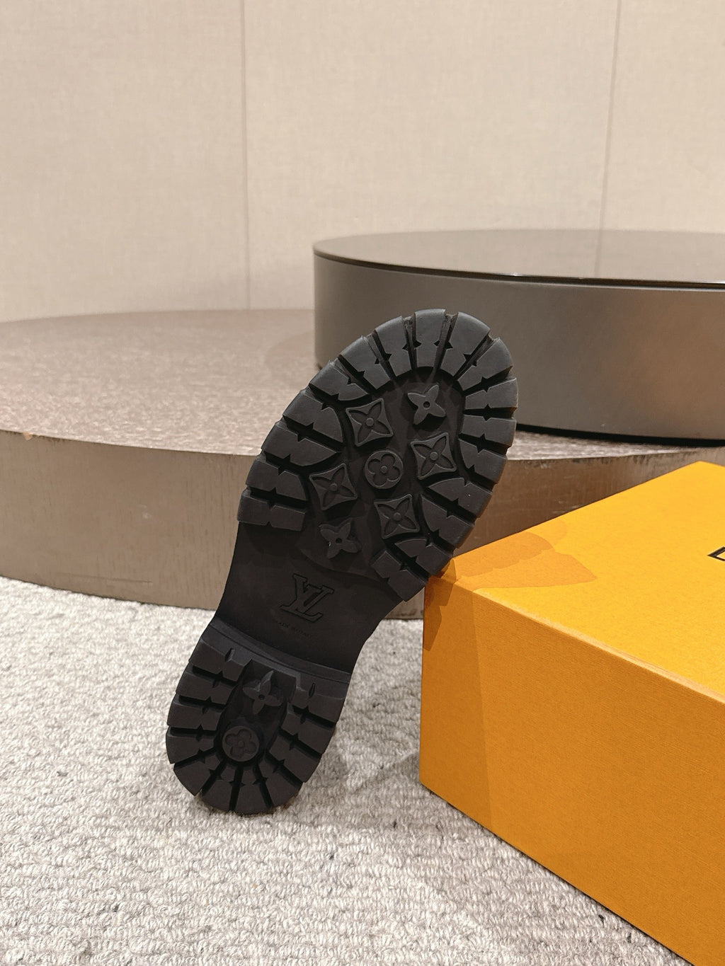 Black rubber outsole for ankle boot with deep tread pattern