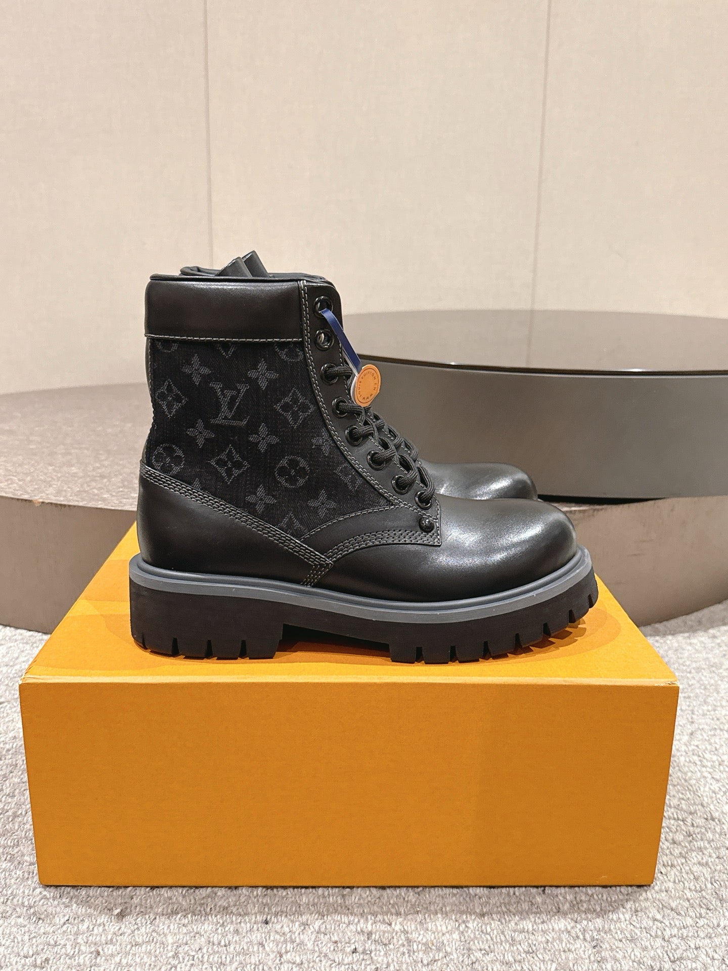 Louis Vuitton unisex lace-up ankle boots in black monogram leather, chunky tread sole